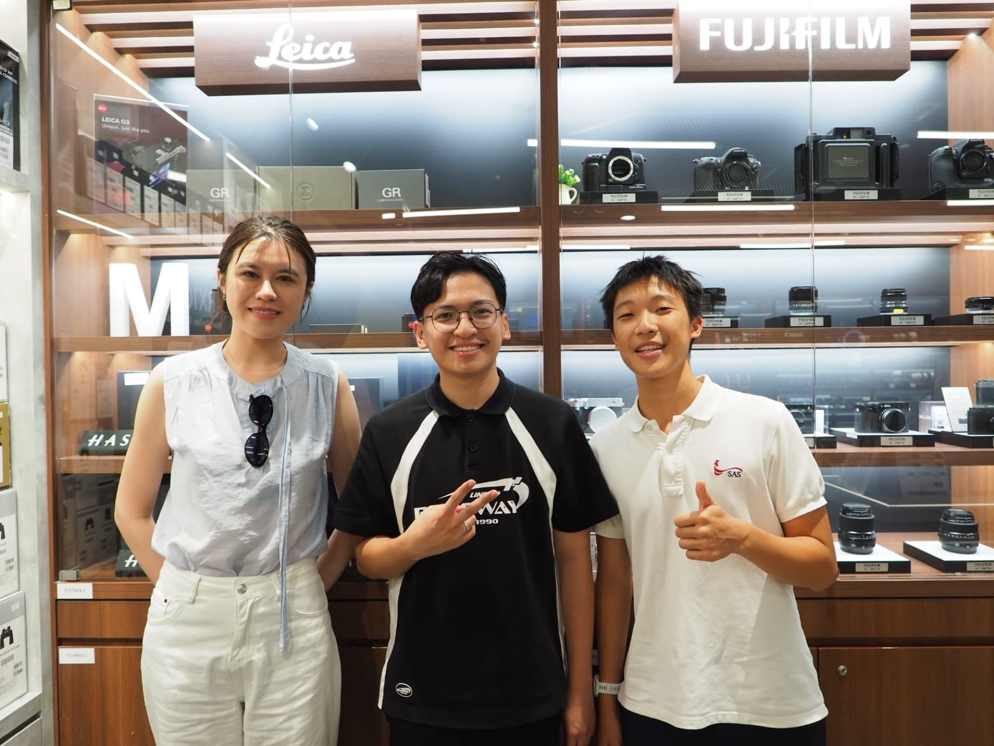 Sam with AstroYouth equipment partners at a camera shop