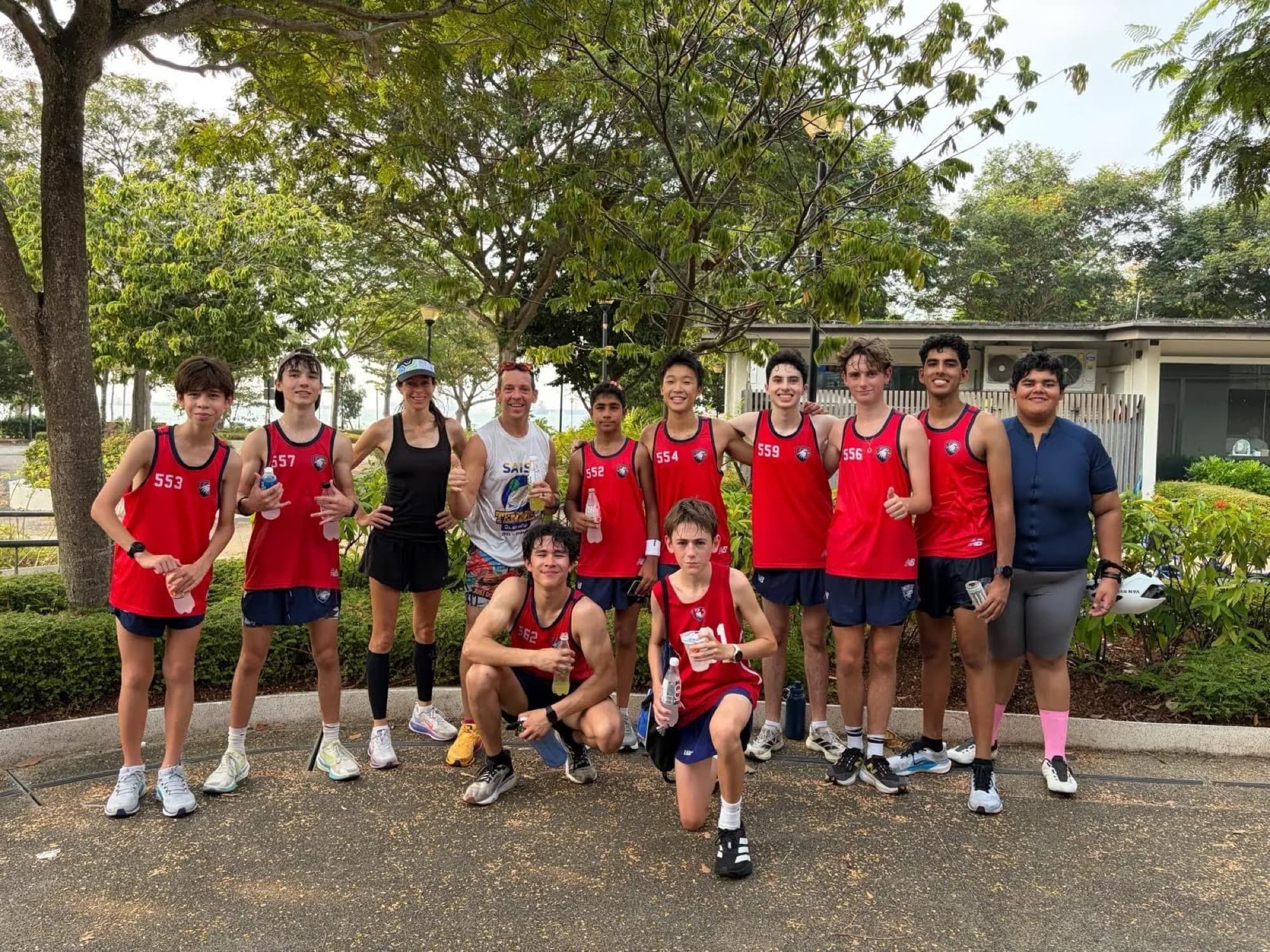 Sam with his cross country team